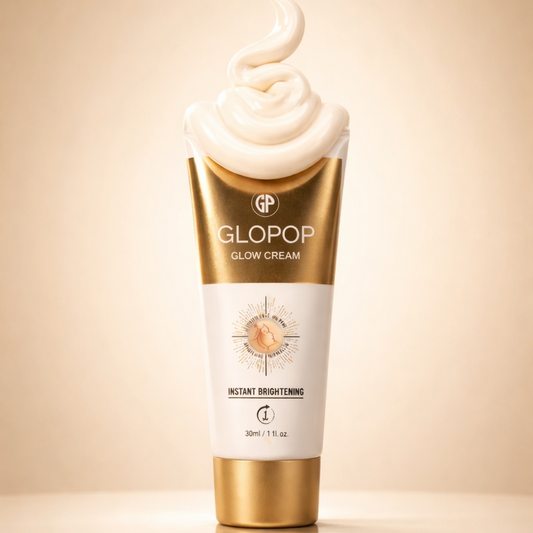 GLOPOP Glow Cream tube with cream on top against a beige background